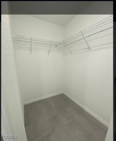 a view of a room with racks on the wall