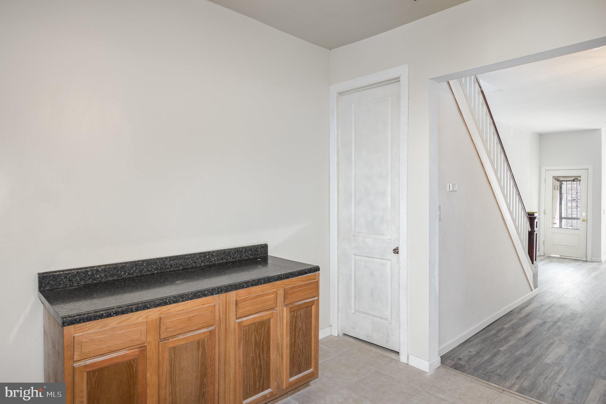 2544 West Fairmount Avenue Baltimore, MD 21223 - Photo 13 of 20 an entryway with wooden floor