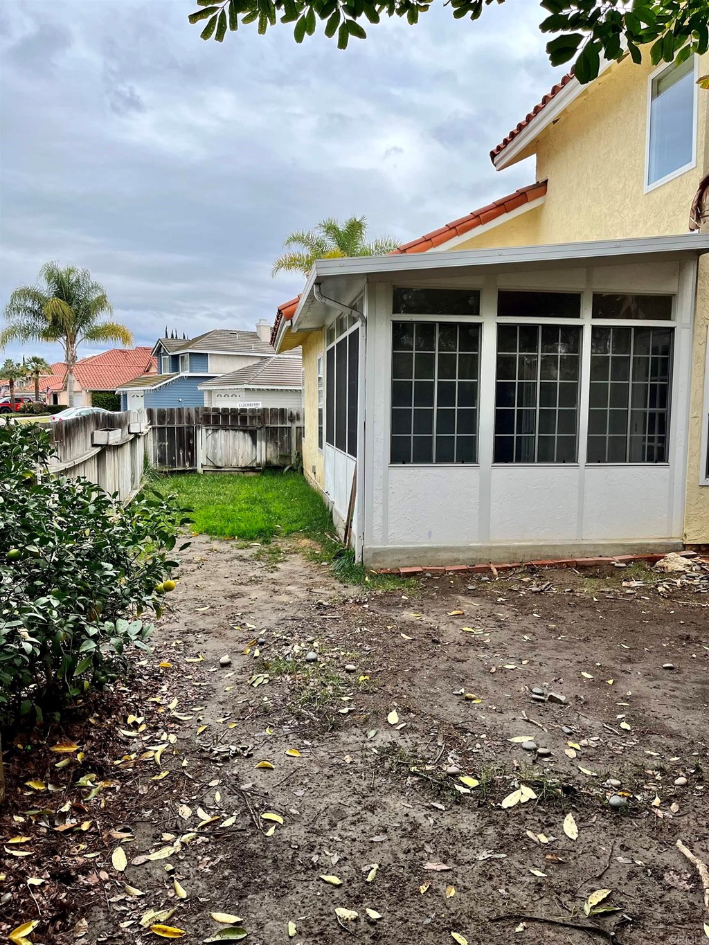 5403 Elderberry Way Oceanside, CA 92057 - Photo 19 of 19 a front view of a house with a garden