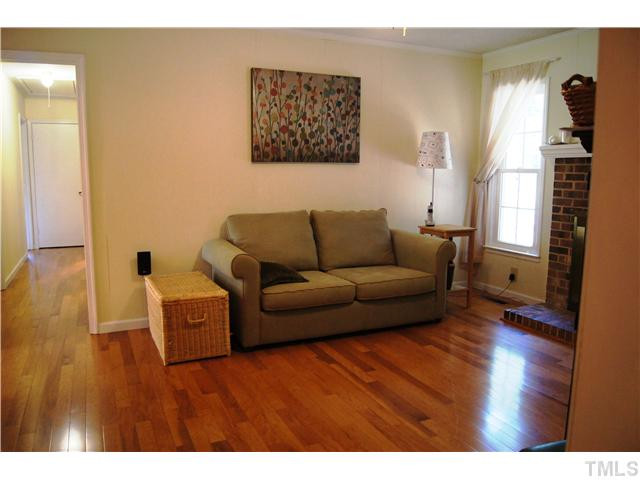 5822 Newhall Road Durham, NC 27713 - Photo 15 of 25 Home features Hardwood Floors in the Formal Living Room, Dining Room, Family Room and Hallway. Den/Family/Great Room