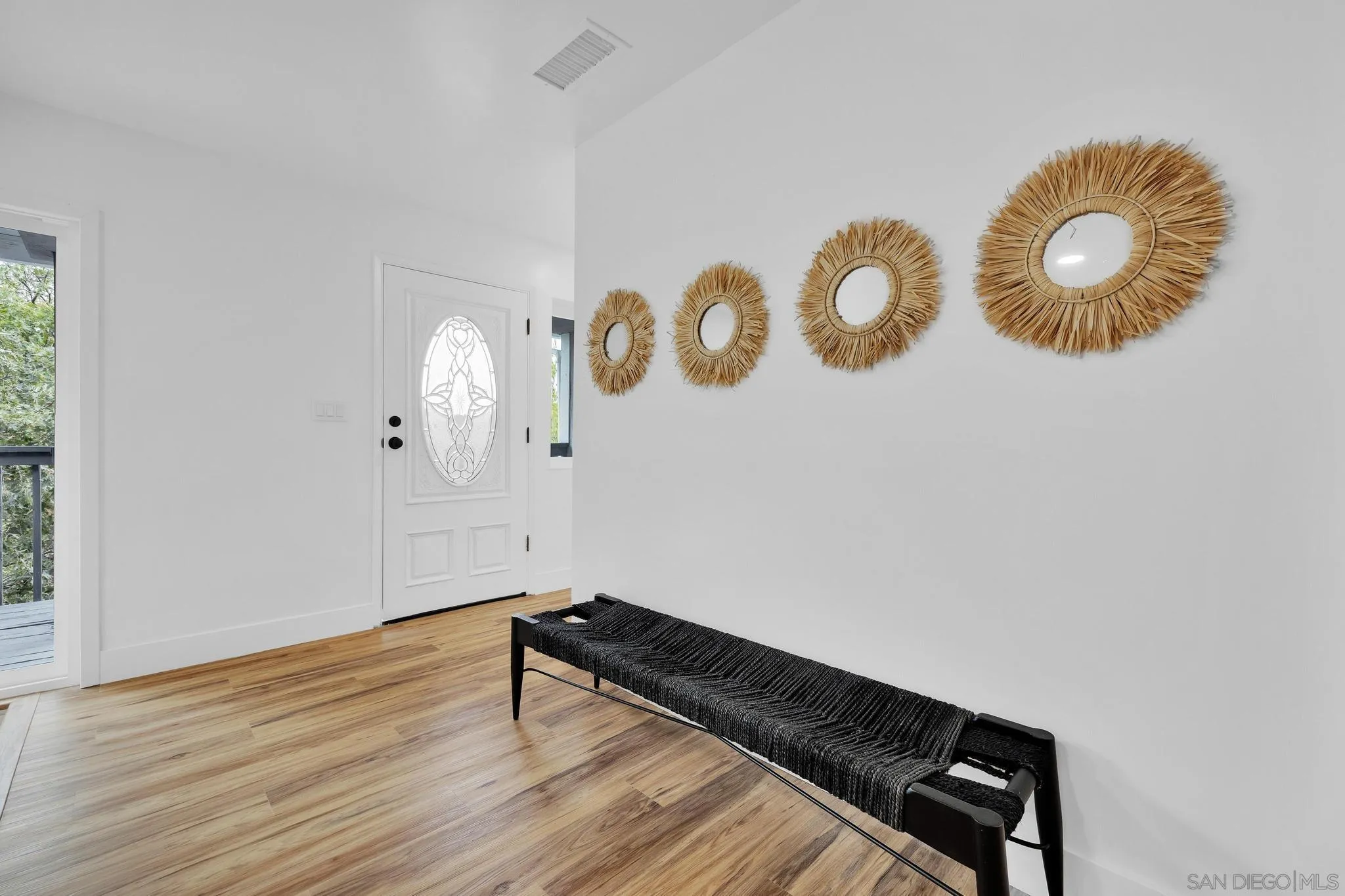 859 Pine Cone Drive Julian, CA 92036 - Photo 13 of 43 a view of a room with wooden floor and glass door
