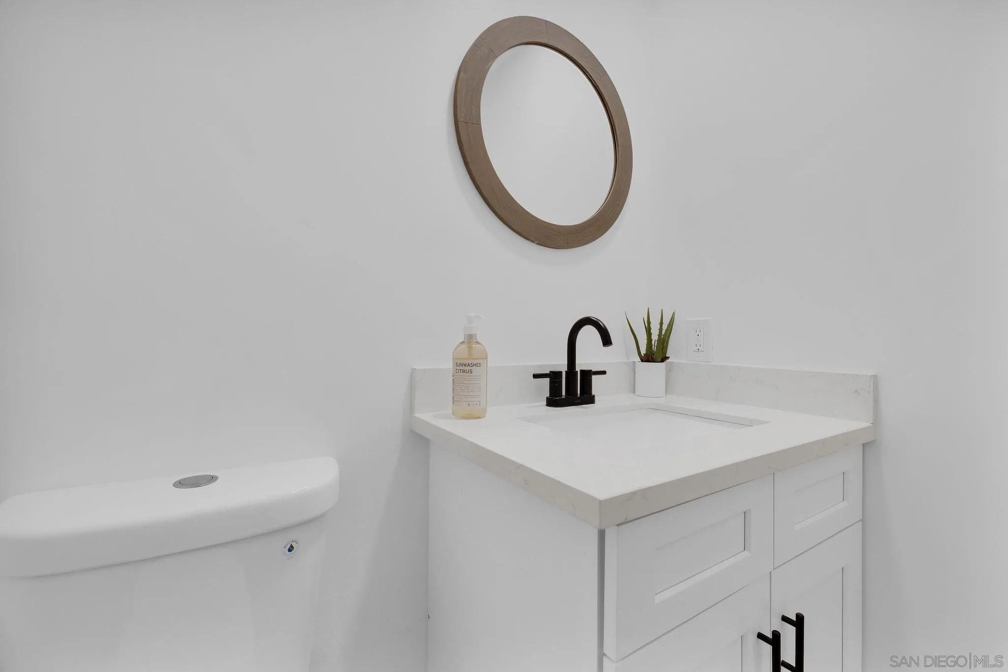 859 Pine Cone Drive Julian, CA 92036 - Photo 15 of 43 a bathroom with a sink and a mirror