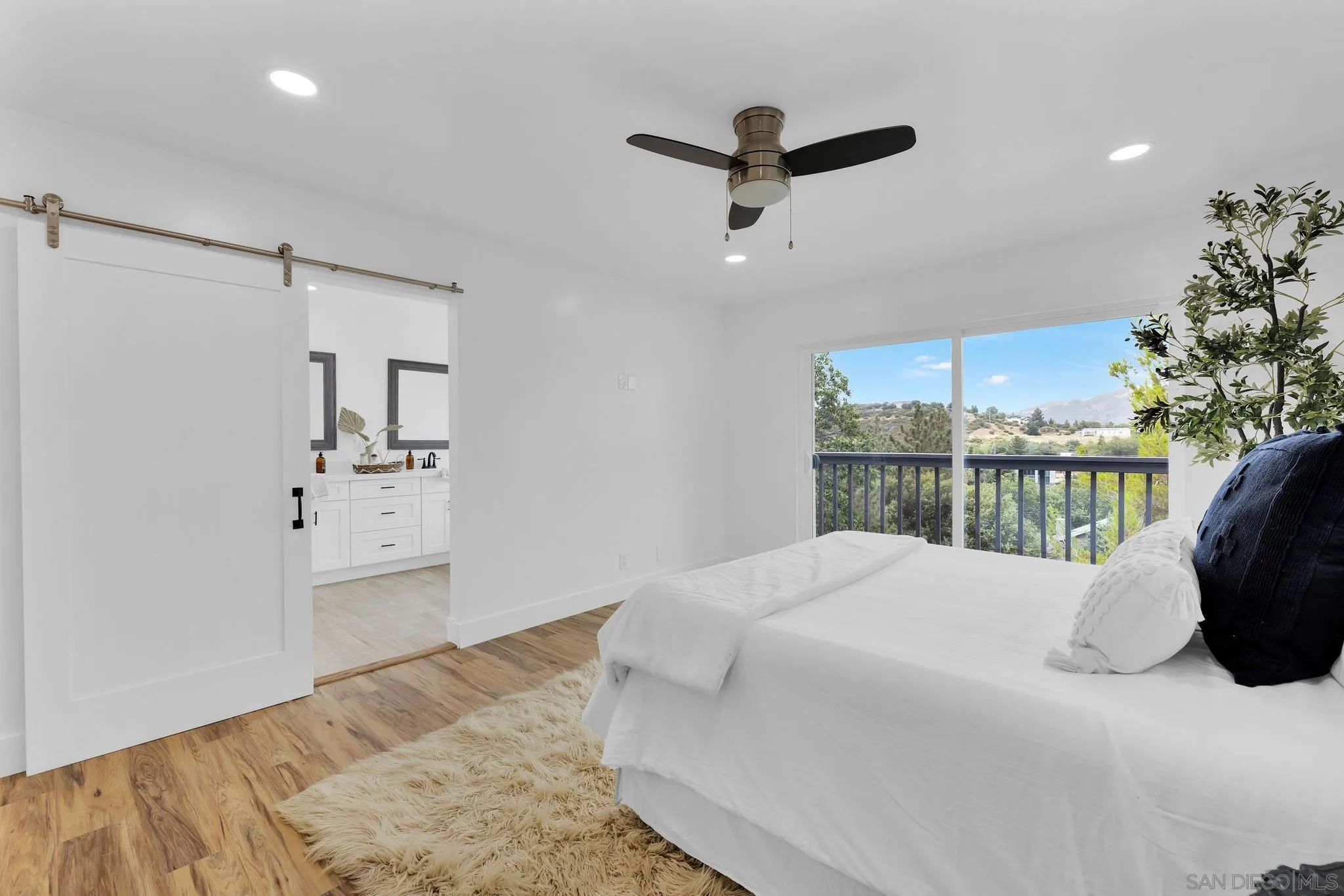 859 Pine Cone Drive Julian, CA 92036 - Photo 18 of 43 a large bedroom with a bed and a dresser