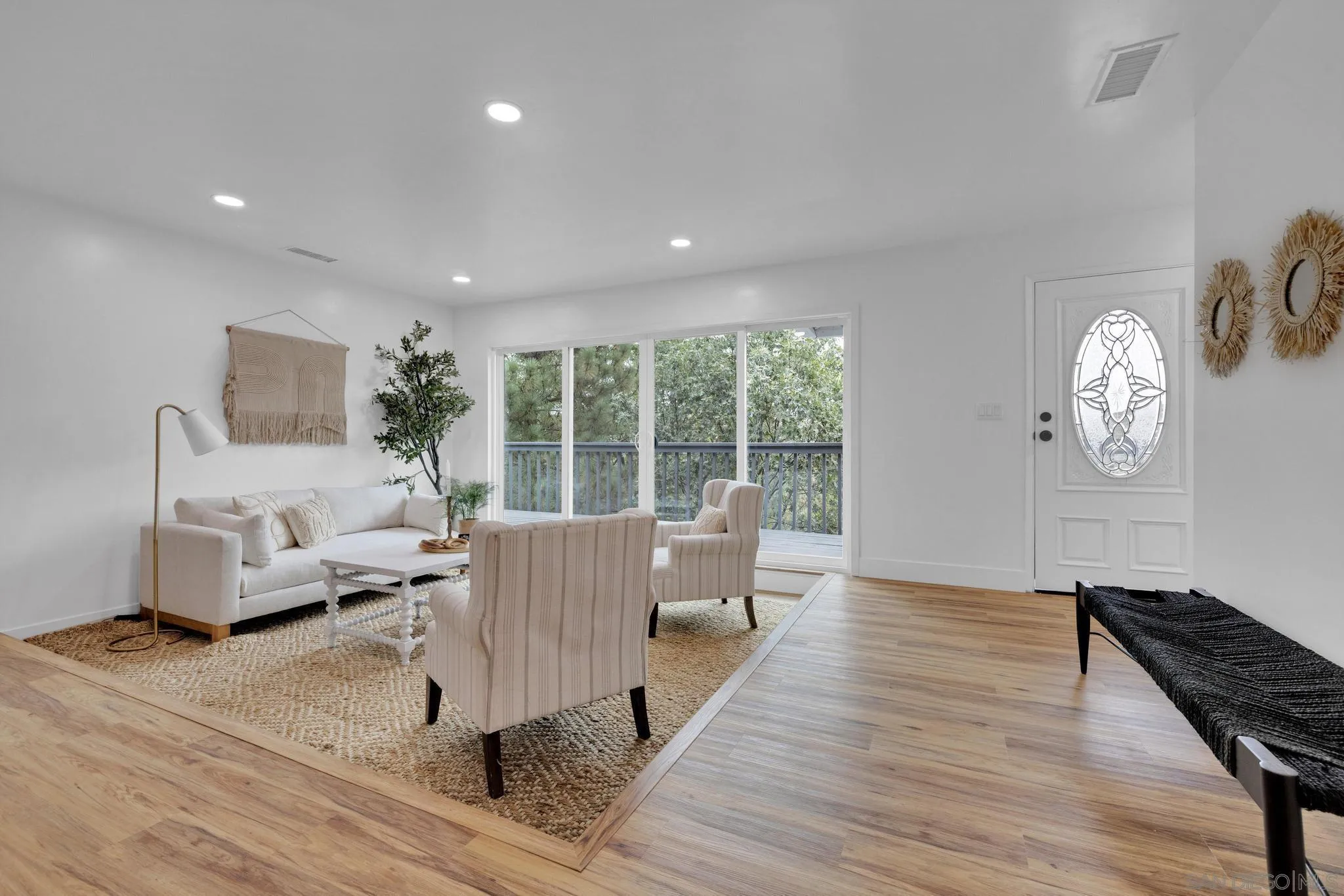 859 Pine Cone Drive Julian, CA 92036 - Photo 3 of 43 a living room with furniture and wooden floor