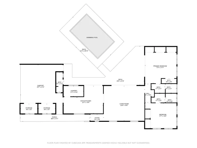a view of a swimming pool with a yard