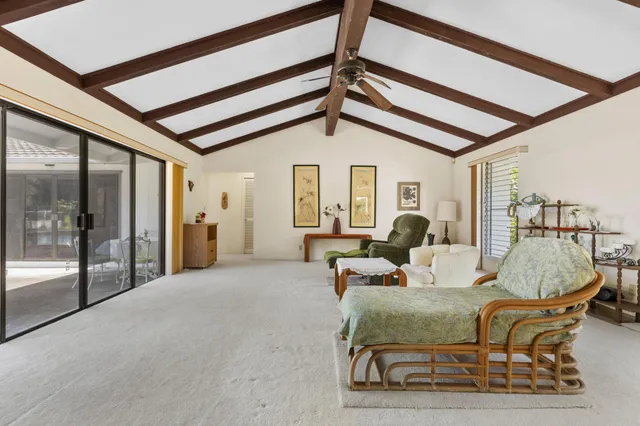 a very nice looking dining room with a large window