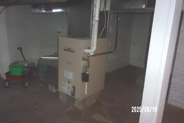 a bathroom with a shower and a toilet