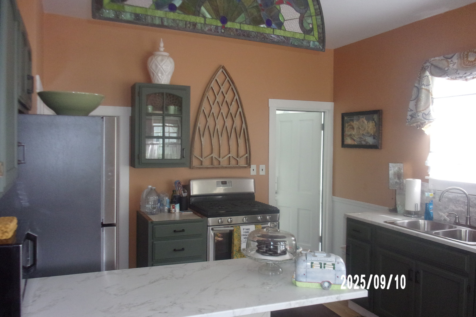 325 South Race Street Piper City, IL 60959 - Photo 9 of 25 a kitchen with a refrigerator and a stove