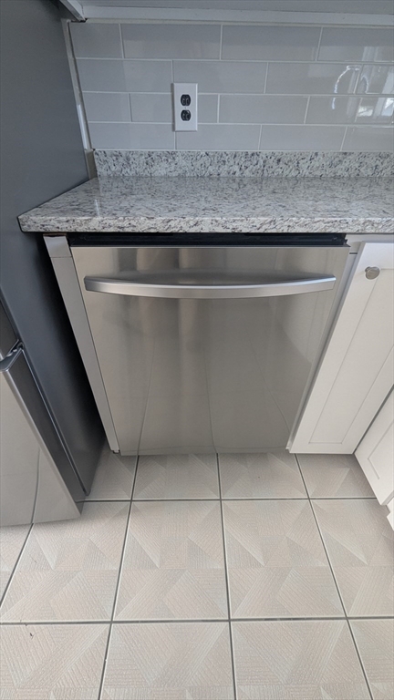 69 Main Street, Unit 2 Foxboro, MA 02035 - Photo 11 of 17 a close view of stove