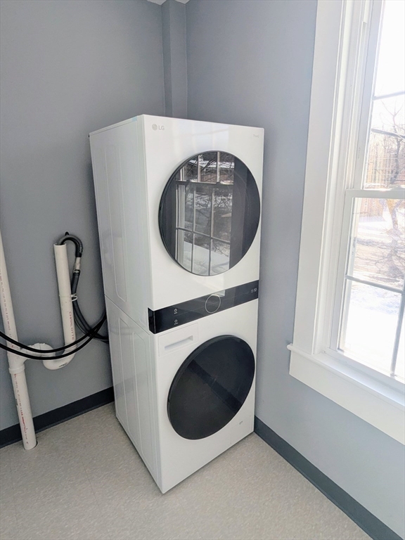 69 Main Street, Unit 2 Foxboro, MA 02035 - Photo 15 of 17 a utility room with dryer and washer
