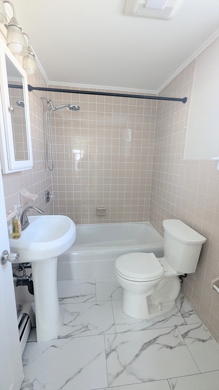 69 Main Street, Unit 2 Foxboro, MA 02035 - Photo 6 of 17 a bathroom with a sink toilet and shower