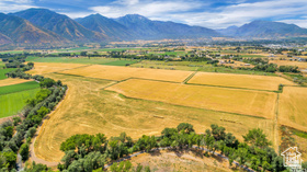 19 East Southfield Road Spanish Fork, UT 84660 - Photo 19 of 74 Overview of rural landscape featuring a mountainous background