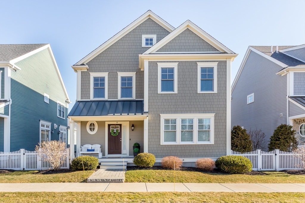 8 Cooks Farm Road, Unit 8 Franklin, MA 02038 - Photo 1 of 30 a front view of a house with garden