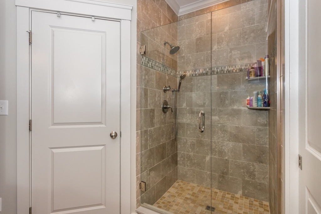 8 Cooks Farm Road, Unit 8 Franklin, MA 02038 - Photo 12 of 30 a bathroom with a shower