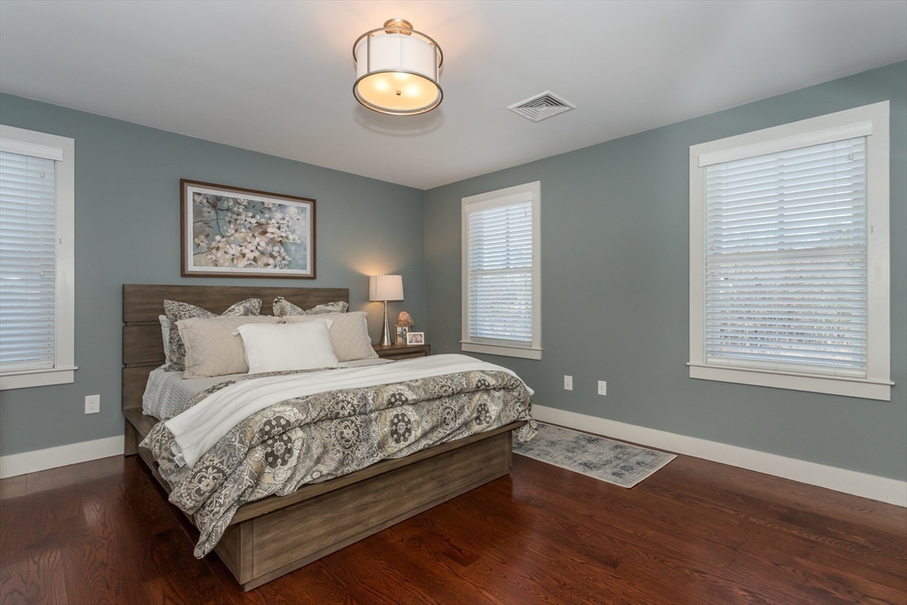 8 Cooks Farm Road, Unit 8 Franklin, MA 02038 - Photo 14 of 30 a bedroom with bed and window