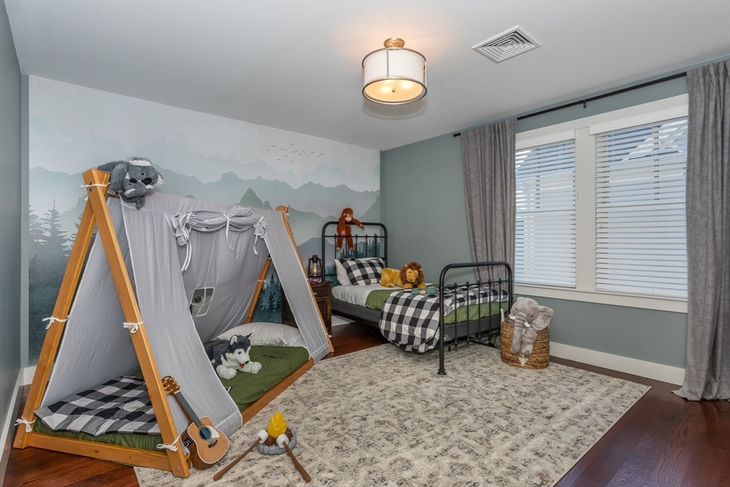 8 Cooks Farm Road, Unit 8 Franklin, MA 02038 - Photo 15 of 30 a living room with furniture and a wooden floor