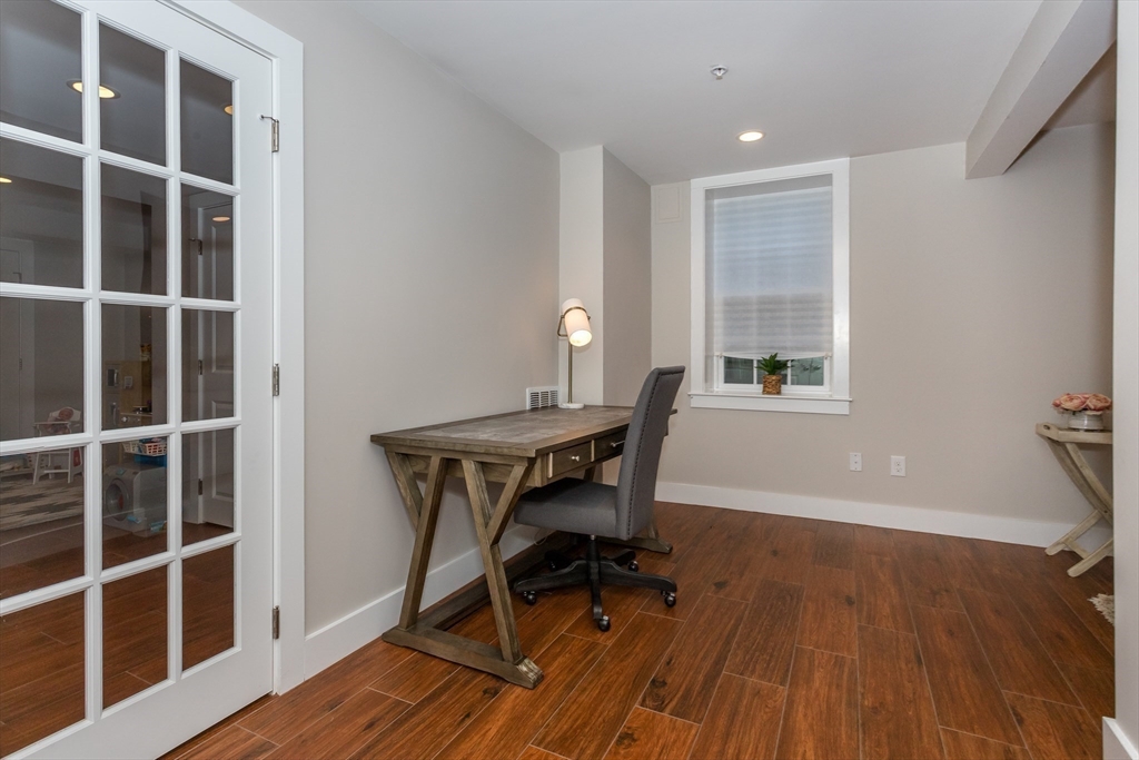 8 Cooks Farm Road, Unit 8 Franklin, MA 02038 - Photo 23 of 30 a workspace with furniture and a window