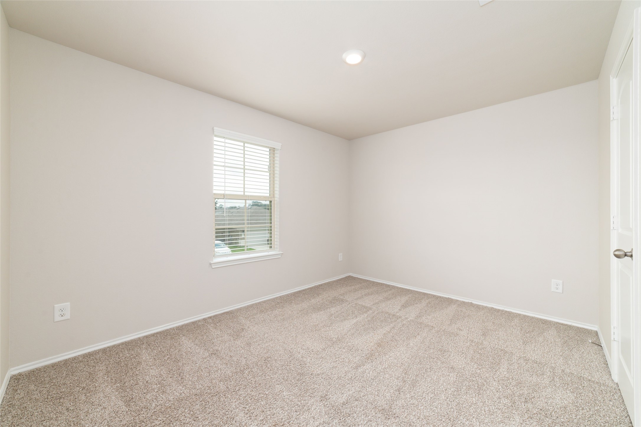 23702 Harrow Field Ln Spring Spring, TX 77373 - Photo 16 of 32 an empty room with a window