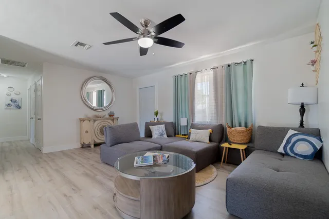 a bathroom with a shower and a sink