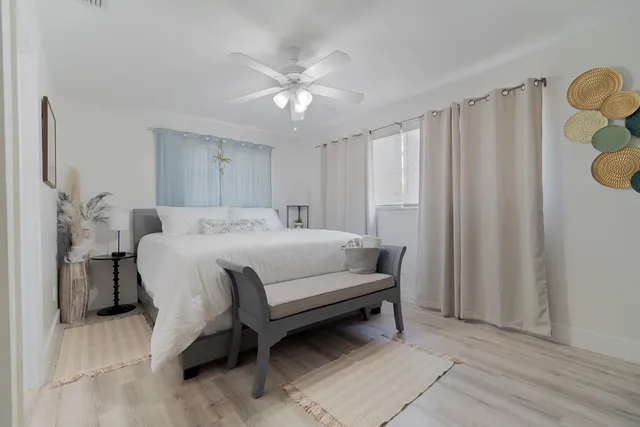 a swimming pool with outdoor seating and yard