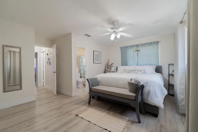 a view of a chairs and table in the patio