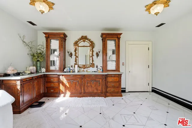 a view of living room with granite countertop furniture and a large window