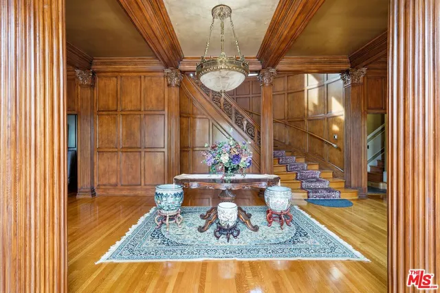 a view of a living room with a rug and a table