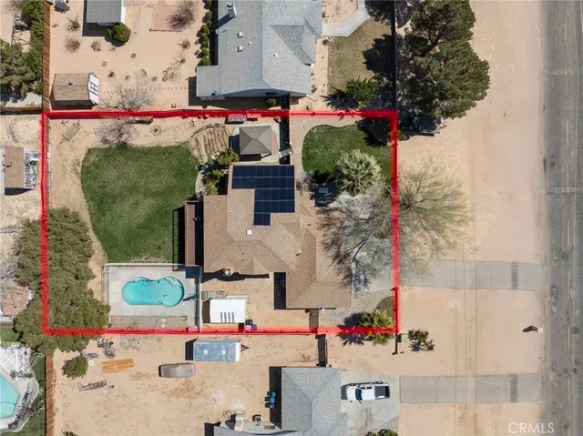 an aerial view of houses and roads