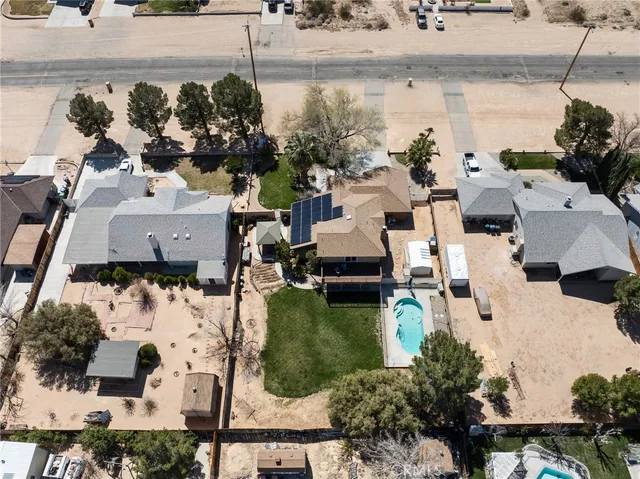 an aerial view of a houses with outdoor space