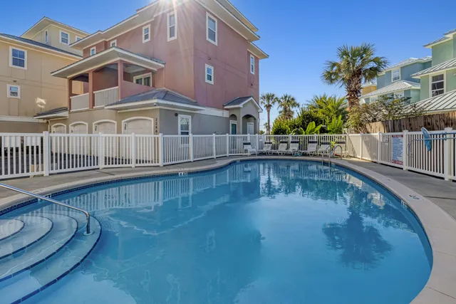 a view of a house with a swimming pool