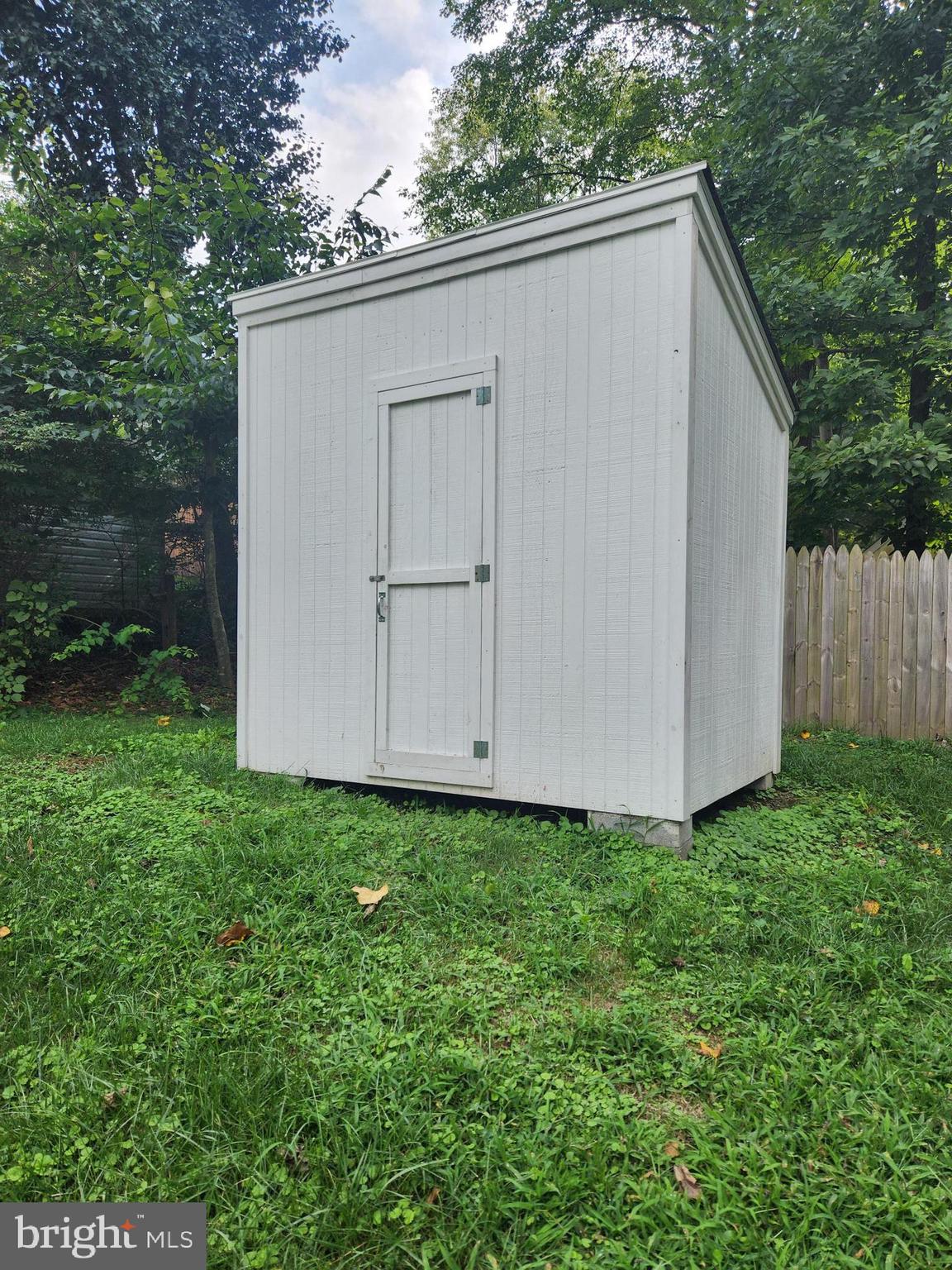 6017 Maple Road St. Leonard, MD 20685 - Photo 11 of 13 a view of a backyard
