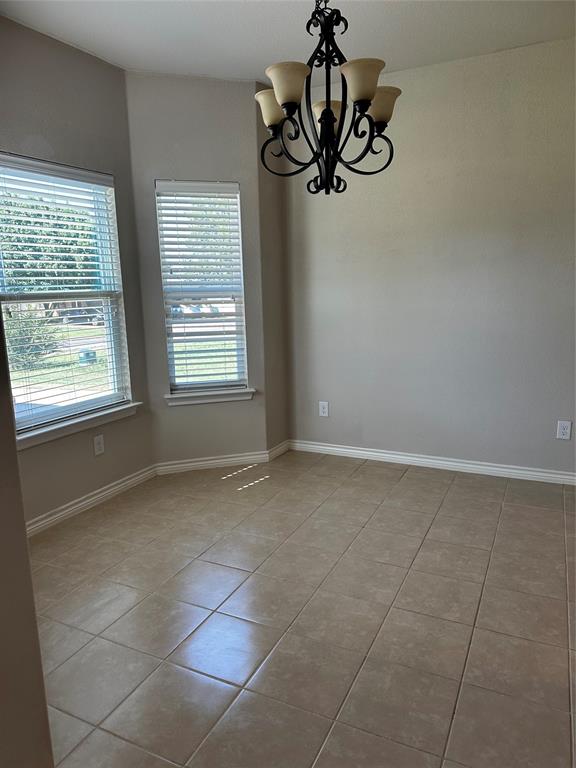 1908 Elizabeth Street Sherman, TX 75090 - Photo 2 of 17 a view of an empty room with a window