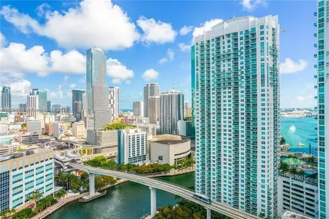 a view of a city with tall buildings