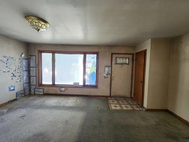 an empty room with windows