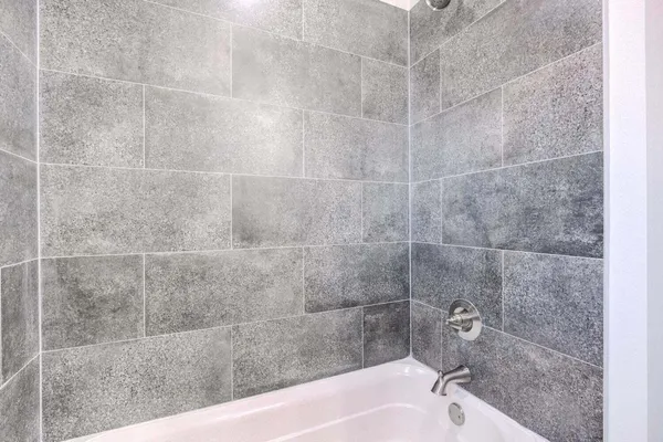 a bathroom with a bathtub