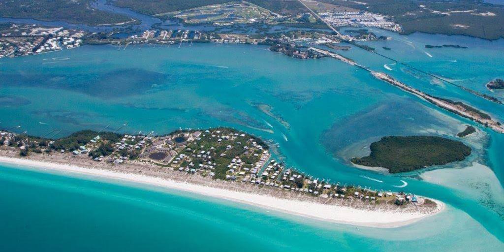 8598 Marsh Street Boca Grande, FL 33921 - Photo 10 of 10 a view of a golf course with a lake