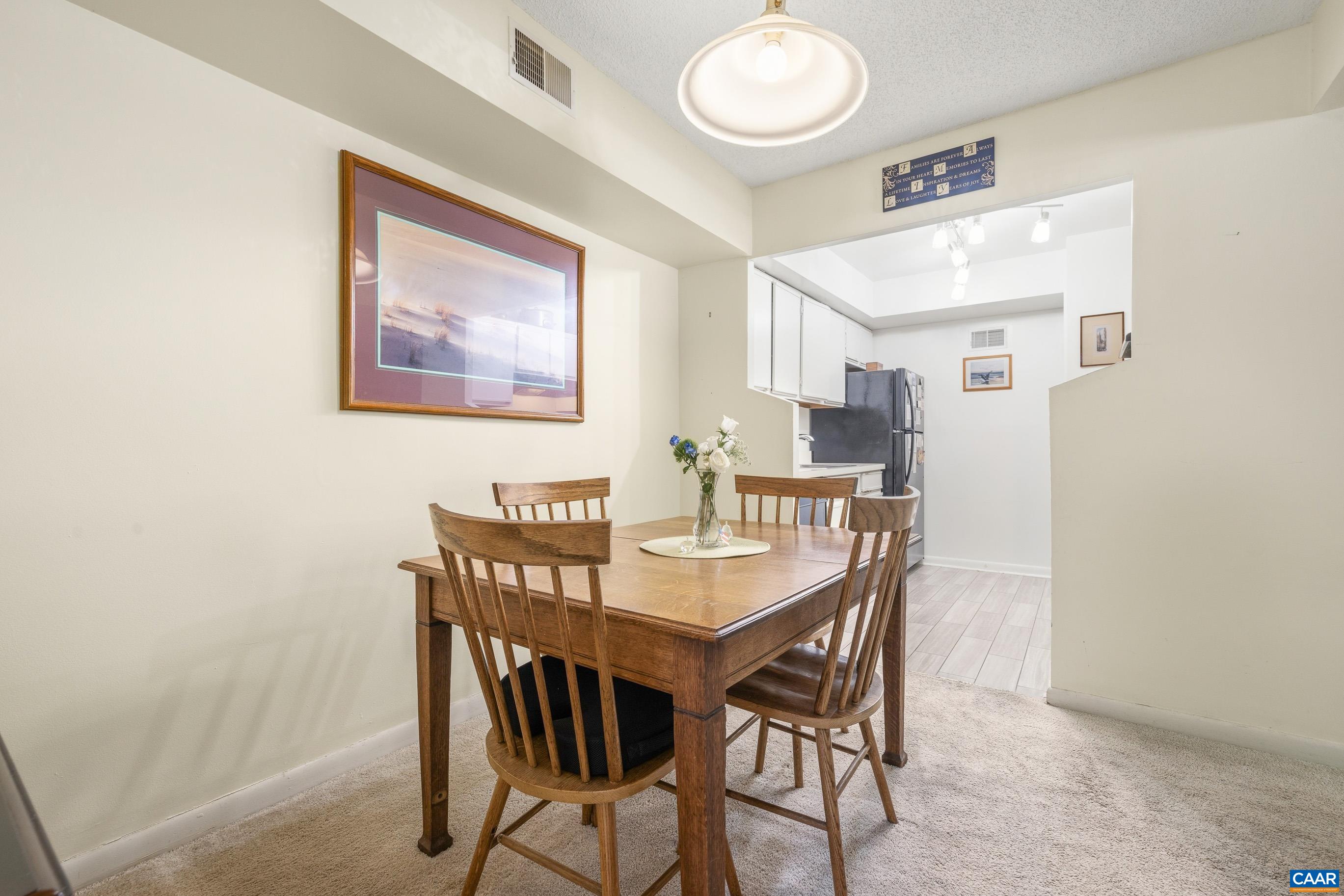 103 Turtle Creek Road, Unit 1 Charlottesville, VA 22901 - Photo 11 of 24 a view of a dining room with furniture