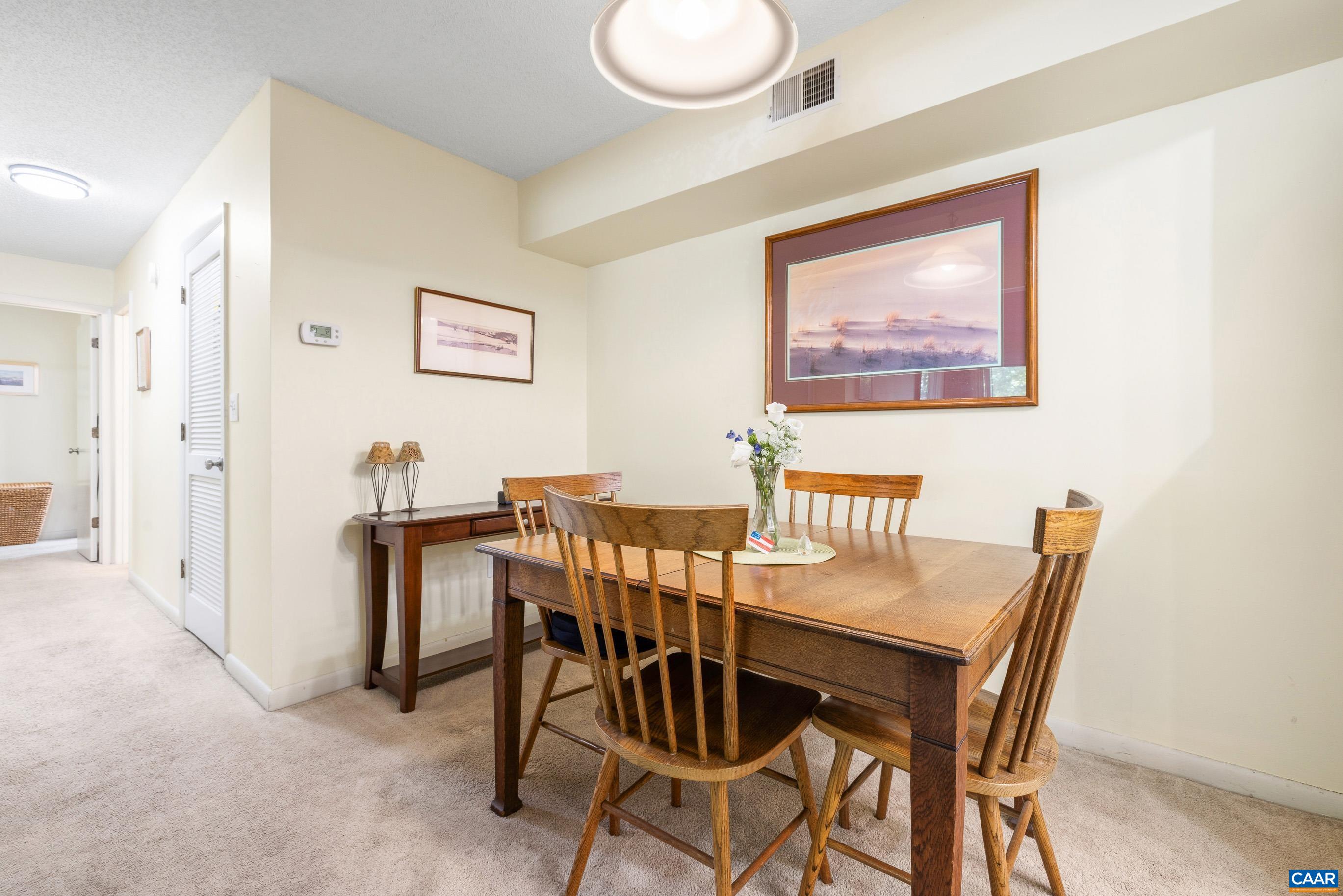 103 Turtle Creek Road, Unit 1 Charlottesville, VA 22901 - Photo 10 of 24 a view of a dining room with furniture
