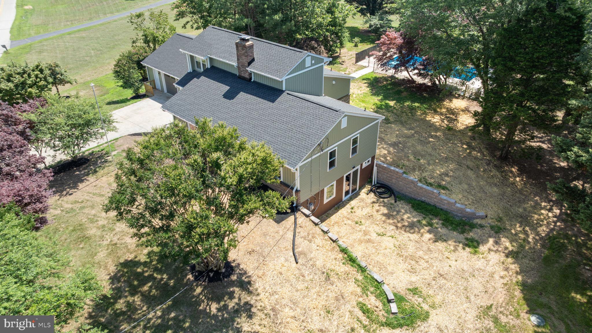 4735 Paul Hance Road Huntingtown, MD 20639 - Photo 54 of 64 a view of a house with a yard