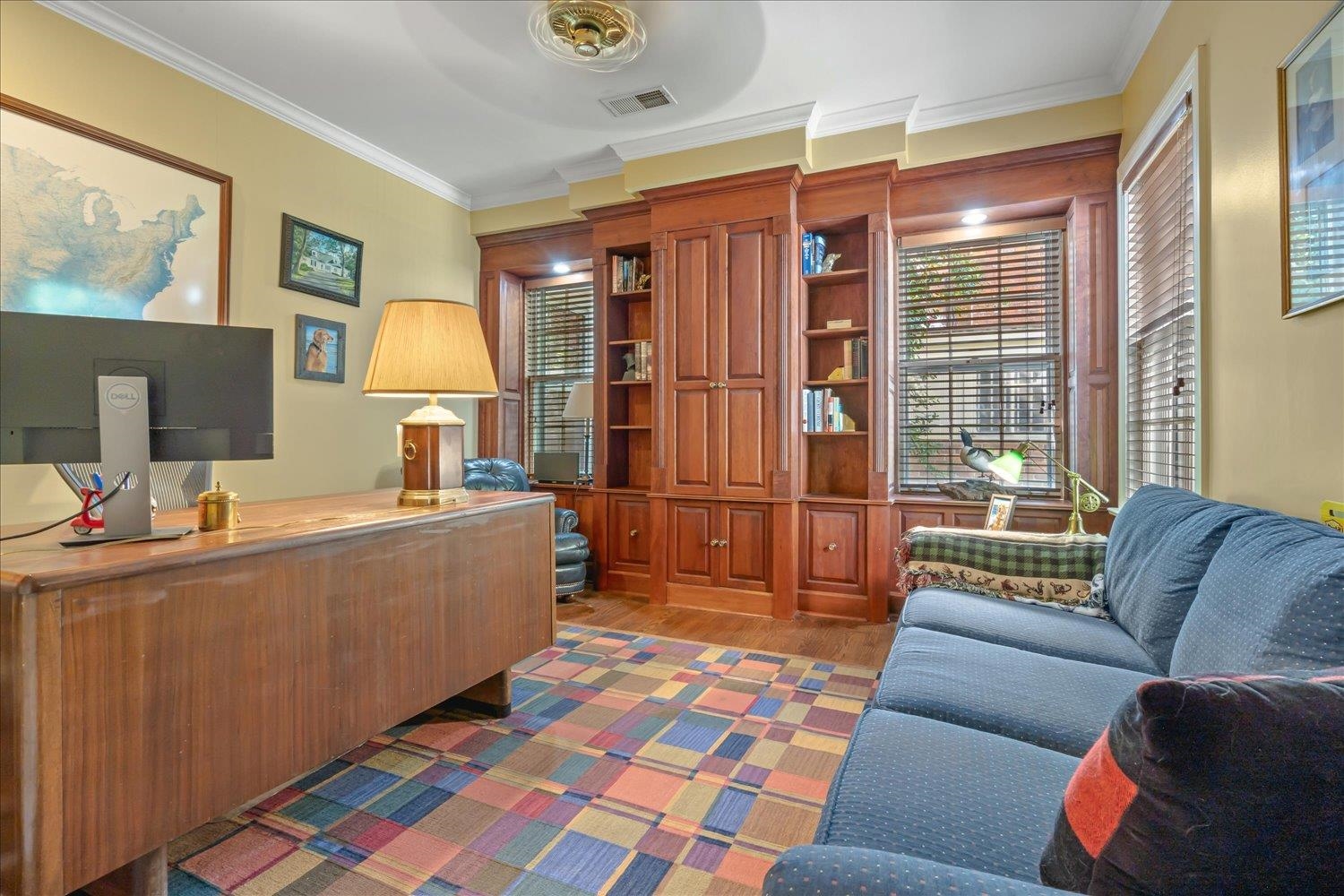 24 South Rose Road Memphis, TN 38117 - Photo 25 of 40 a living room with furniture and a flat screen tv