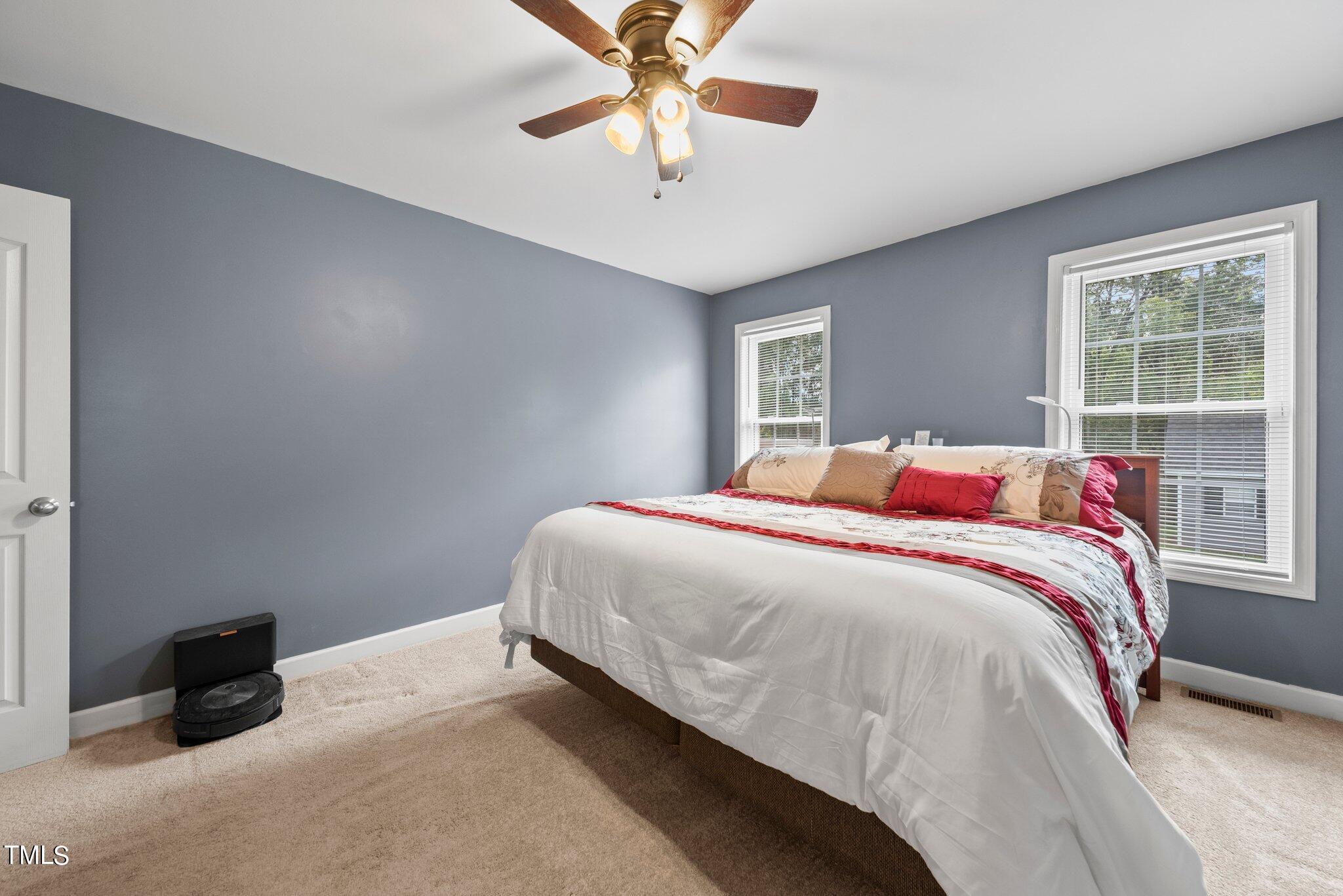2461 Farrell Road Mebane, NC 27302 - Photo 13 of 35 a bedroom with a bed and window