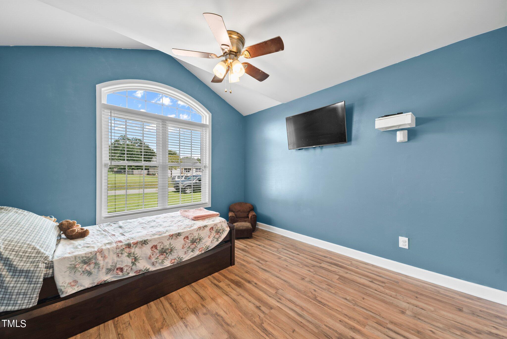 2461 Farrell Road Mebane, NC 27302 - Photo 18 of 35 a bed room with a bed and a window