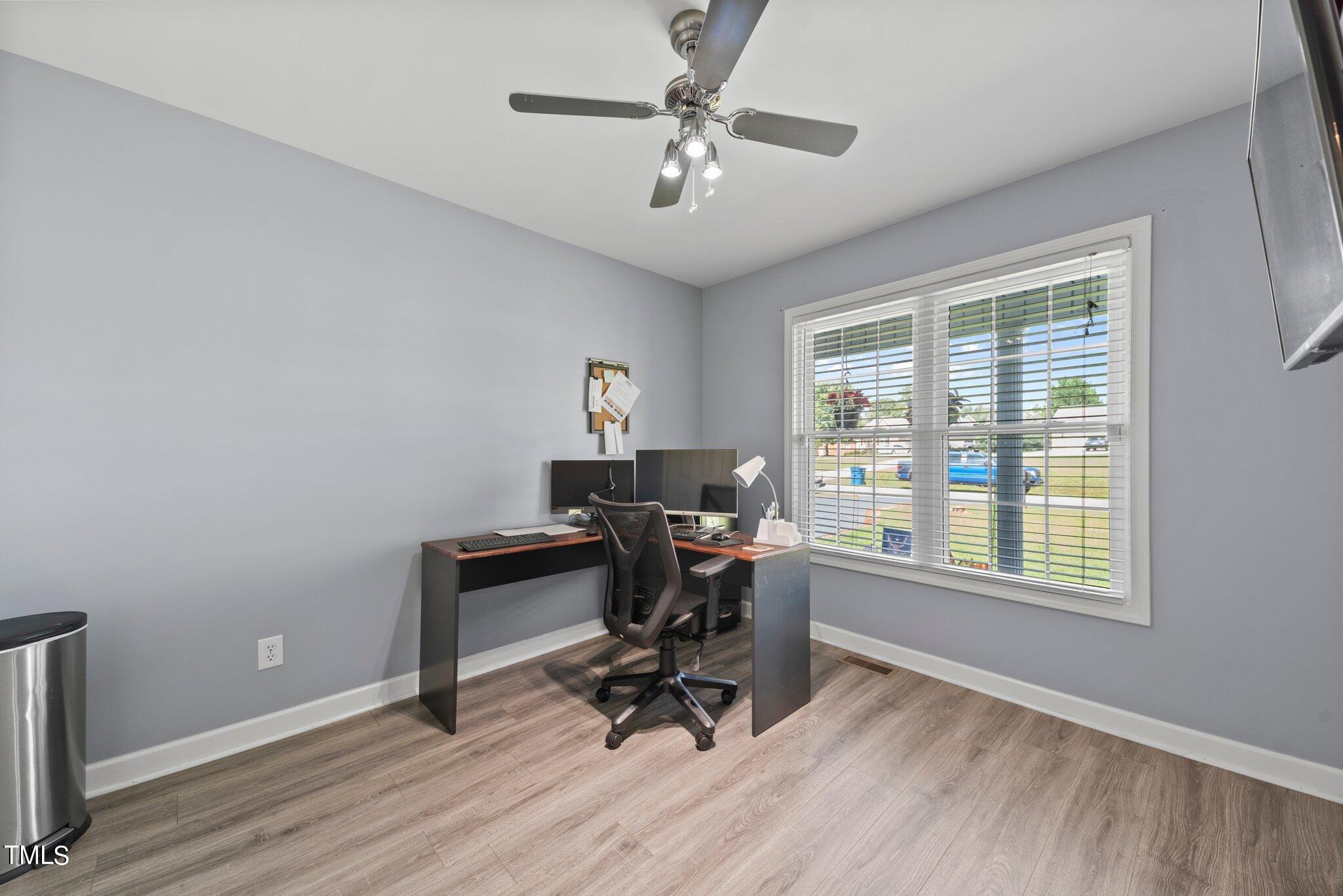 2461 Farrell Road Mebane, NC 27302 - Photo 20 of 35 a workspace with wooden floor and a window