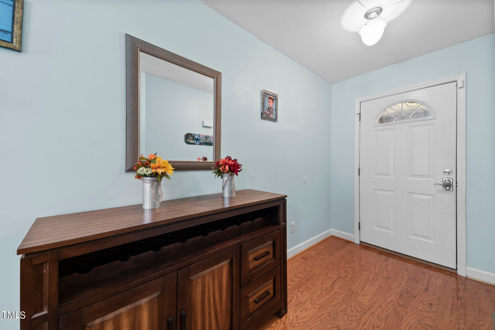 2461 Farrell Road Mebane, NC 27302 - Photo 2 of 35 a room with a sink and a mirror