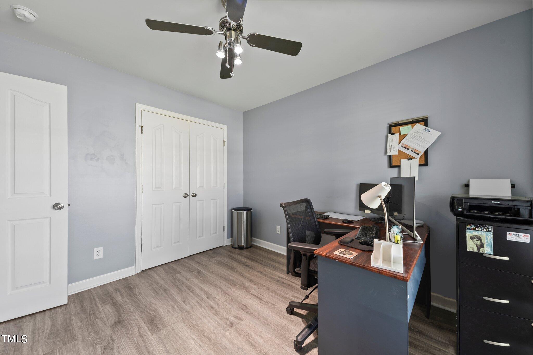 2461 Farrell Road Mebane, NC 27302 - Photo 21 of 35 a view of a workspace with furniture and wooden floor