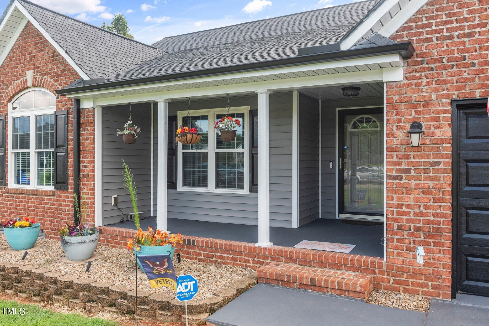 2461 Farrell Road Mebane, NC 27302 - Photo 33 of 35 a view of entrance of the house and front door