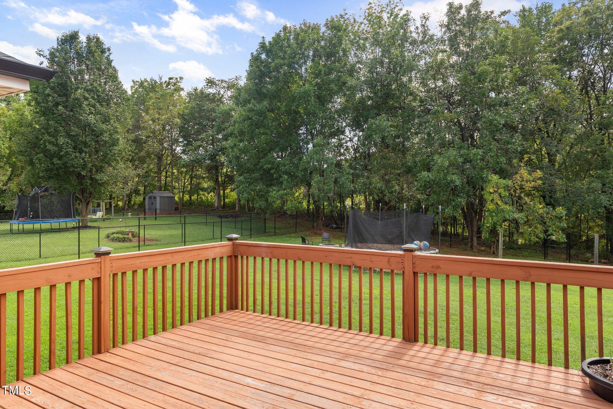 2461 Farrell Road Mebane, NC 27302 - Photo 34 of 35 a balcony with trees in front of it