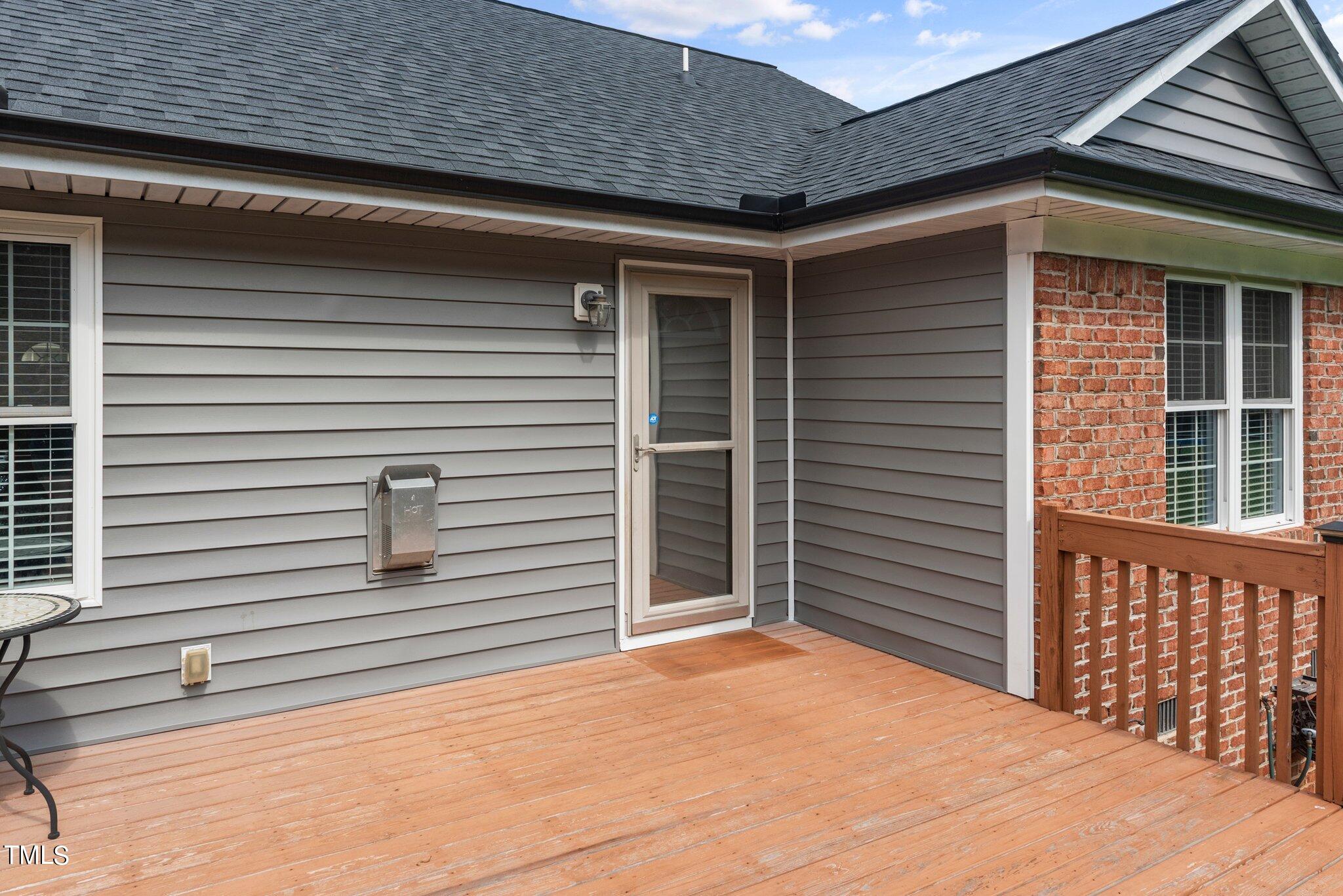 2461 Farrell Road Mebane, NC 27302 - Photo 35 of 35 a view of house with wooden deck