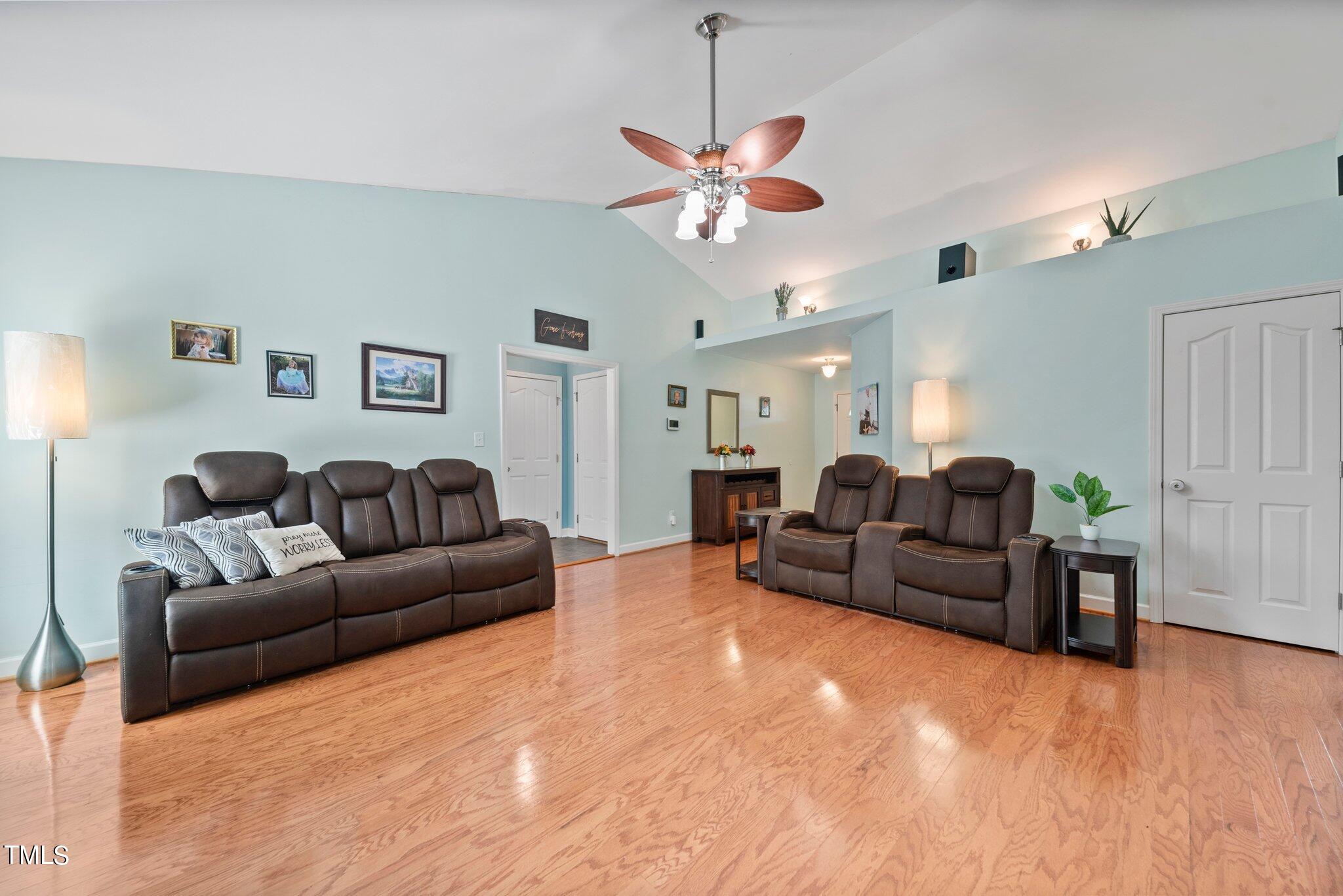 2461 Farrell Road Mebane, NC 27302 - Photo 5 of 35 a living room with furniture and a chandelier