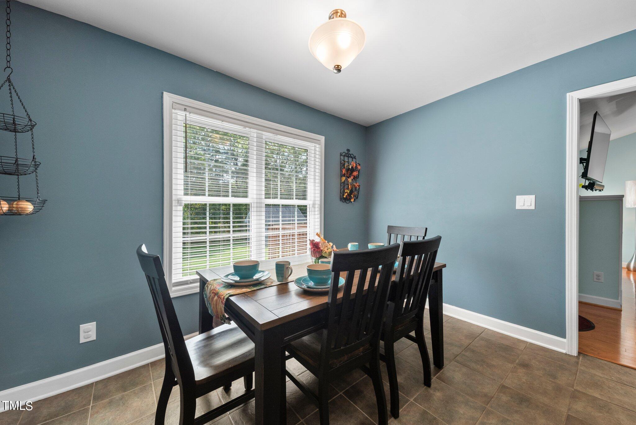2461 Farrell Road Mebane, NC 27302 - Photo 7 of 35 a view of a dining room with furniture window and outside view
